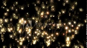 Colourful fireworks. Abstract background of moving shimmering coloured particles. Shimmering particles with Bokeh. New year and christmas 2024 background. Noise. Seamless 4K looping video animation Stock Video