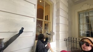 VIDEO: Man seen breaking window of Capitol with riot shield now arrested (Footage courtesy of CNN) | WDBJ7