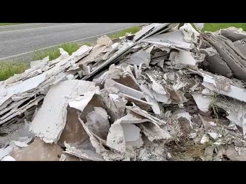 "Clean up on Aisle 7!!" Full trailer load of sheet rock destroyed.