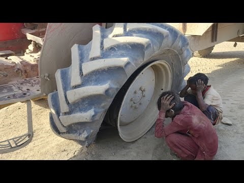 Massive Tire Recovery: Massey Ferguson 375 Mountain Repair & Rescue