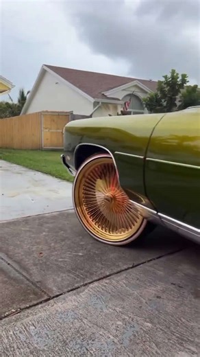 Chevy donk on gold 24's Daytons and Vogues