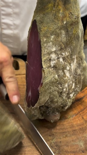 Nicolas Sintes on Instagram: "2025 Top 10 N°9 — Lamb ham. Forget the pork: we’re talking ruby-red meat, melt-in-the-mouth fat, and that unmistakable scent of the wild Mediterranean hills. Would you dare to trade your usual cured ham for lamb? 👇 Jambon d’agneau. Oubliez le porc : ici, on parle d’une chair rubis, d’un gras fondant et de ce parfum inimitable de garrigue. #LambHam #CuisineProvençale #CharcuterieLover #GourmetExperience #ChefLife"