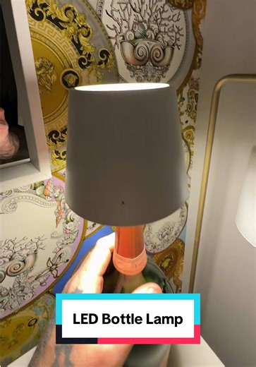 LED Cordless Touch-Control Bottle Lamp Turn any bottle into a stylish light with this cordless LED bottle lamp. Designed to sit neatly inside the neck of a bottle, it instantly transforms empty glass bottles into a modern decorative lamp for your home, bar or outdoor setup. The touch-control top allows you to easily switch between lighting modes and adjust brightness. With multiple colour options and RGB lighting, you can create the perfect atmosphere whether you’re relaxing at home, hosting fri