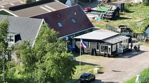 Farmers protest in The Netherlands, dutch flag upside down. Protest actions by dutch farmers. government wants to limit livestock farming to solve the nitrogen environmental crisis. Demonstrations