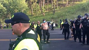 Protesters clash with police during Trump 2020 Mt. Rushmore visit