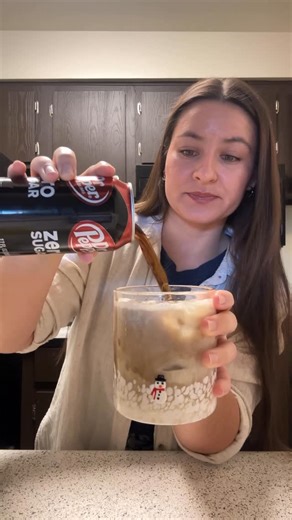 Katerina Diaz on Instagram: "SALTED EGGNOG DR PEPPER🎄😮‍💨 This one’s a fun one to try if you haven’t already! All you need: Ice 2 ounces eggnog Pinch of salt (optional but highly recommended) 1 can @drpepper Combine the eggnog and salt and mix until combined. Add ice and Dr Pepper to a cup and pour the salted eggnog magic over the soda. Stir to combine and enjoy 🤎 #eggnog #eggnogdrink #dirtysoda"