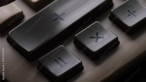 close up finger pressing calculator buttons, vintage push button calculator macro, accounting concept, budget and expense planning, financial reporting Stock Video