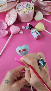 Simple Conversation Heart cake pops. #cakepoptv #cakepops #chocolatecolors #chocolate #edible #poppypaint #xoxo #poppycolorllc #valentines #valentinesday | CakePoptv