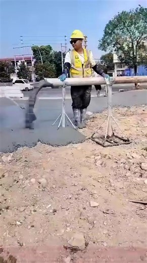 Worker spreads concrete slurry using pipeline #shorts #construction #concrete