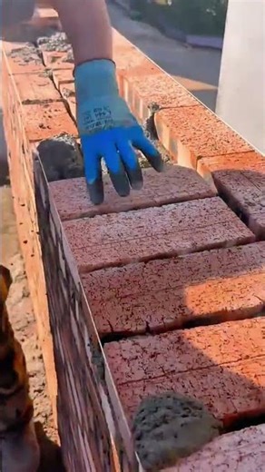 Install the new red brick layer with mortar following the measuring thread guide