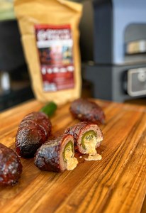 Today we’re smoking armadillo eggs on our Ninja Woodfire Grill using some awesome new pellets from Smokin’ Pecan. We’re covering all the flavors of the rainbow here! Spicy, sweet, smokey, savory! Too dang good! 🔥#armadilloeggs #smokinpecan #ninjawoodfire #ninjawoodfiregrill #smokedmeat #kinders #thermopro #dalstrong #ergochef #jalapeño #jalapenopoppers 🔥 | Cooking with CJ