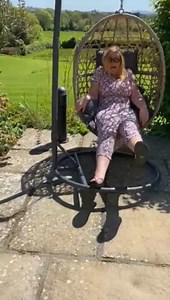 1.4K views | This woman hilariously crashed off of a swinging egg chair. When she sat on the chair, it swung backward due to her weight and eventually toppled over. Thankfully, she wasn't injured. | Jukin Copyright Management | Facebook