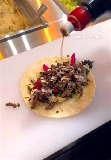 Authentic Syrian flavors in every bite! 🔥 Our mini beef shawarma wrap is made the traditional way—juicy, flavorful, and wrapped to perfection. One bite, and you’re hooked! 😍🍽️ #RealShawarma #SyrianFlavors #TasteTheTradition #SyrianShawarma #AuthenticFlavors #Foodie #damaskinoshawarma #vancouverfoodie #vancouverisawesome