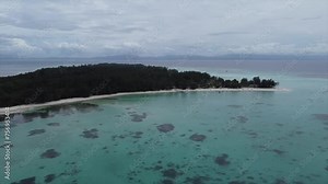 Mantanani Island: Malaysian gem in Sabah South China Sea. White sandy beaches, clear waters, perfect for snorkeling and relaxation.