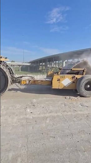 Thick Concrete Road Demolition Using a Rotary Impact Method