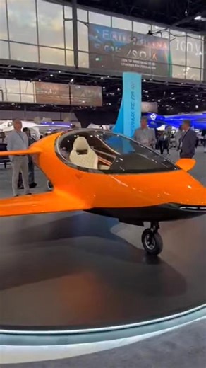 The Bright Orange Jet Pod Redefines Private Aviation at the Expo #JetPod #FutureAviation #AerospaceExpo #LuxuryCockpit #NextGenFlight #CinematicShowcase #4KUltraHD #SciFiTech | NextGen Innovations | Facebook
