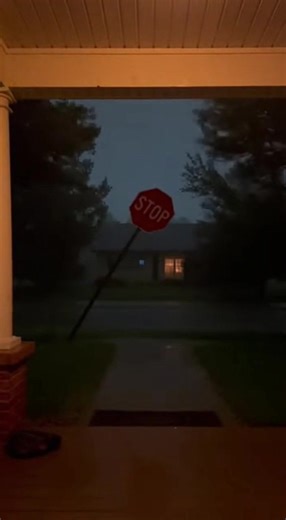 This stop sign is one gust away from coming down 🛑💨 #fyp #stormtok #strongwinds #caughtoncamera #weather