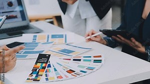 Team of Creative Web Graphic Designer planning, drawing website ux app for mobile phone application and development template layout, process to developing prototype wireframe, User experience concept.