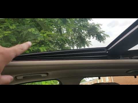 BMW x5 roof problem. roof partially stuck.