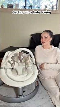 Setting up our little baby swing in preparation for the arrival of our baby