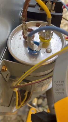 How do I check amps with the multimeter for the AC unit? ￼