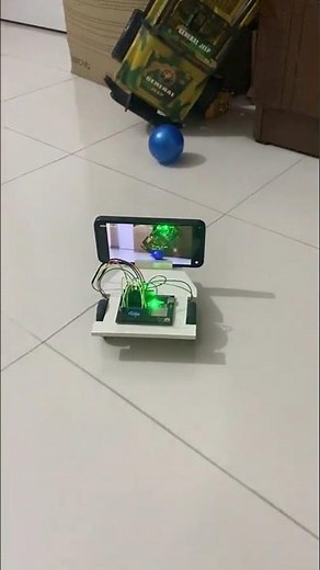 Real-Time Object Tracking Robot Using OpenCV, Android, and Microcontrollers