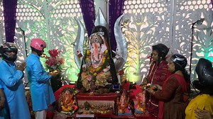 Devotees in Surat bid adieu to Lord Ganesh wearing helmets