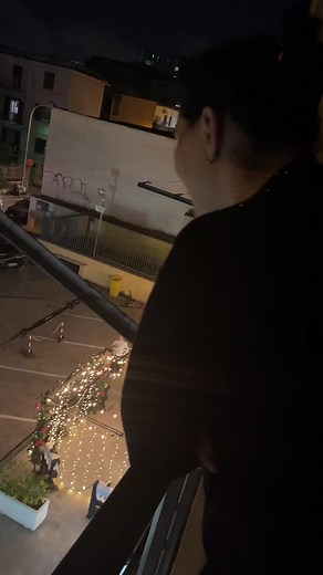 Nighttime Balcony View with Christmas Lights
