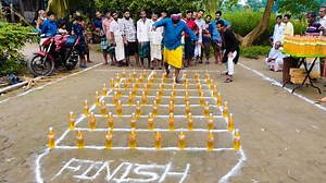 9.2M views · 98K reactions | গ্রামের চাচাদের চোখ বাঁ*ধা অবস্থায় তেলের টাওয়ারে ভিতর যাওয়ার কঠিন চ্যালেঞ্জ। Local Game | Bangla Food Challenge | Facebook