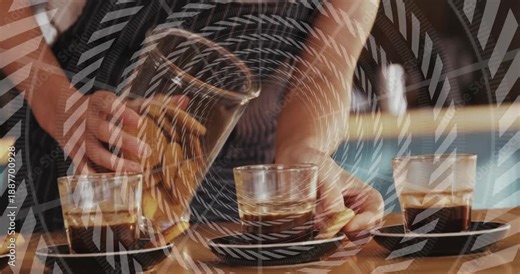 Barista arranging coffee cups and pouring cookies on wooden counter, with animated business graphs