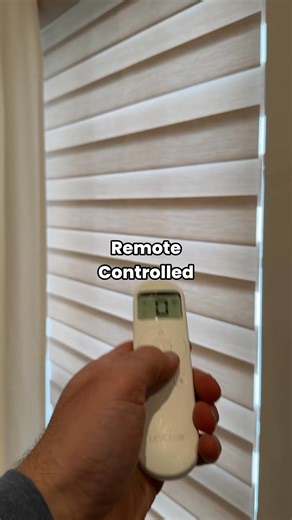 Stop drilling holes in your windows! As part of our living room refresh, I wanted custom shades that look good, are easy to use, and don’t require a complicated install. I was able to order free fabric samples and match them exactly to the stone on our new fireplace. They snapped in within minutes and I can control them from my phone or the remote. Comment LINK and I’ll DM you the link. *Must be following @thebuchaus to receive DM #LivingRoomRefresh #HomeUpgrade #CustomShades #DIYHome #ad | The 