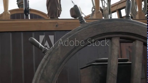 quarterdeck of an old Spanish sailing ship from the 18th century with a helmet and a sword