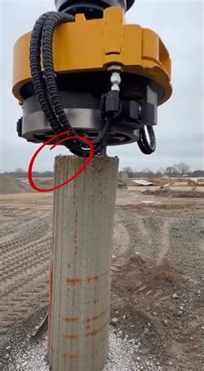 Dynamic tracking shot around a hydraulic pile cutter clamping. #construction #pipelining #automobile