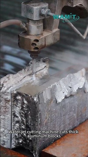 Water jet cutting machine cuts thick aluminum blocks