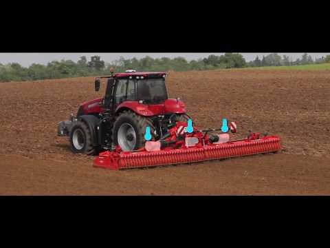 KUHN HR 1040 R - Herse rotative grande largeur (en action)