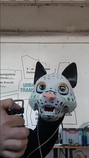 3d-printed cat puppet head with movable eyes and eyelids - #shorts