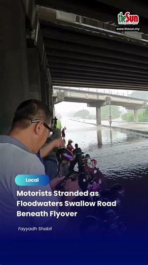 Motorists Stranded as Floodwaters Swallow Road Beneath Flyover
