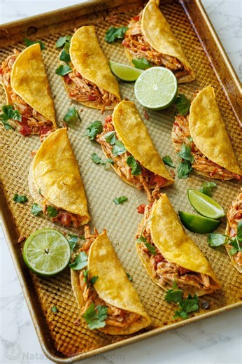 The Easiest, Crispiest Baked Chicken Tacos - done in 30 min! Comment “fiesta” for the recipe. https://natashaskitchen.com/baked-chicken-tacos/ | NatashasKitchen.com