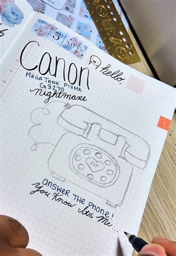 Minions! Let’s call @canonusa to fix me New CANON G3270 MEGA TANK PIXMA Printer! 🤗🤓💙. ( NOT REAL PHONE CALL🤪) #hobonichi #drawings #plannerstickers #art #journaling Stationary, 2026 planner, 2026 hobonichi planner, best planner, A5 Planner, how to use planner, planner into, decorate hobonichi, planner and journal, plan with me, calendar, organize, organize your life, weekly planner, planner ideas, planner inspiration , planner inspo , goals, set up, spreads, layout, pages, the coffee Monster
