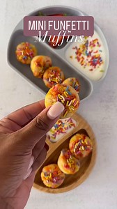 Looking for a fun and tasty treat? These mini funfetti muffins are bursting with colorful sprinkles and packed with flavor. Everything comes together in just one bowl and bake in just 15 minutes for the perfect festive breakfast or snack! Grab the recipe here ---> https://feedingtinybellies.com/funfetti-muffins/ | Feeding Tiny Bellies