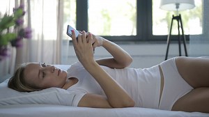 Woman sending messages on her cell phone - Free Stock Video