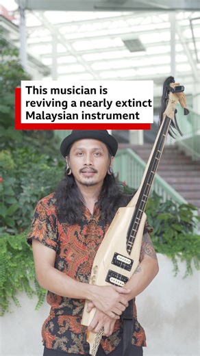 75K views · 1.2K reactions | This musician is reviving a nearly extinct Malaysian instrument called the sundatang.  Gindung began remaking the sundatang in 2017, adapting its sound for modern music genres, like rock.  https://bbc.in/4240lbw | BBC World Service | Facebook