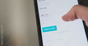 Smartphone screen, process selecting and ordering food from restaurant, delivery, online service. Man's finger scrolls and selects dish, bowl.