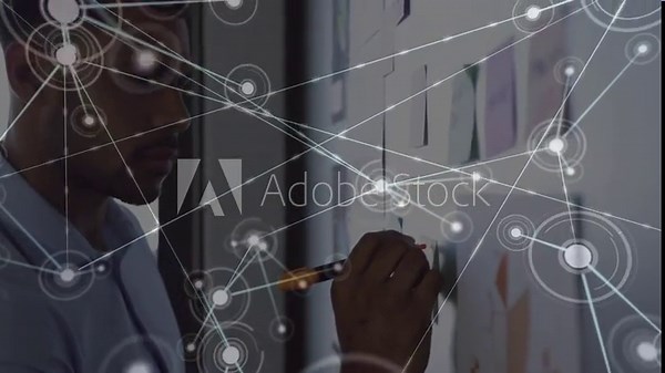 Businessman selecting marker, annotating board and expanding network overlay mapping strategy