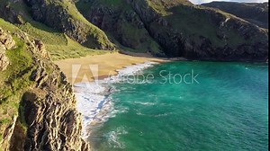 Boyeeghter Bay, commonly known as Murder Hole Beach, is one of the most beautiful beaches in Ireland situated on the Melmore Head Peninsula in County Donegal. Majestic Atlantic waves on sandy beaches