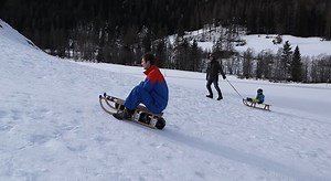 Never Walk Uphill Again With This Motorized Sled
