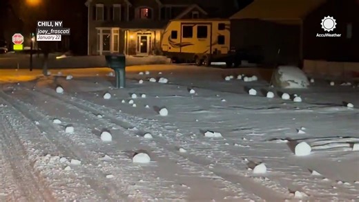 Wind shapes rare snow rollers after snowstorm in New York