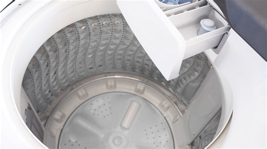 Struggling To Reach The Bottom Of Your Washing Machine? Grab This Kitchen Essential - House Digest