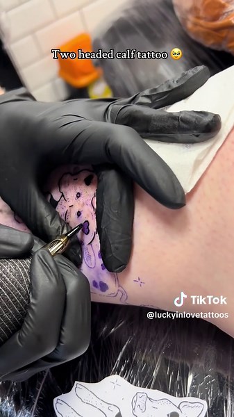 Unique Two-Headed Calf Tattoo Showcase