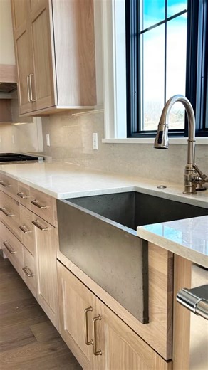 Village Home Stores | Kitchen + Bath on Instagram: "This cold have you stuck at home looking at your kitchen and dreaming of a change? Tour this Quad Cities kitchen in under a minute and you’ll find so much inspiration for your 2026 project with us. Kitchen design and select materials by Village Home Stores featuring White Oak and painted Shade Grown Green cabinetry and a gorgeous walk in butler’s pantry. Shown: Wynnbrooke cabinetry in the Denali door and a combination of White Oak Sand stain fo